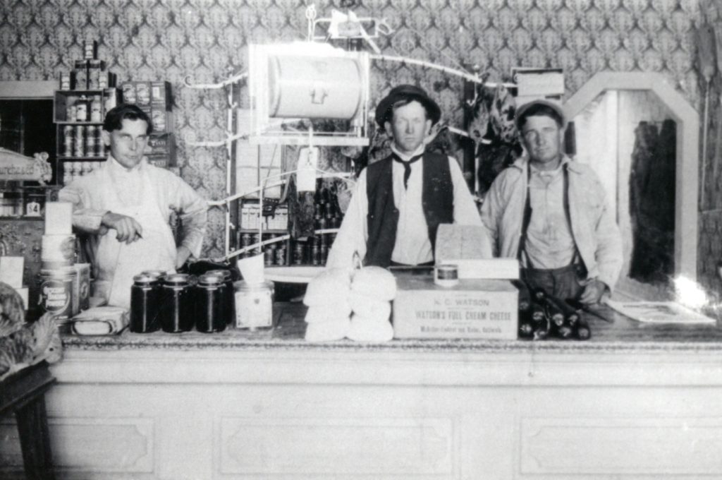 Emerson's Store, Left to Right, Bill Lewis, Jim Mapes, Todd Hemler, 1916. Courtesy of Prentice Holmes