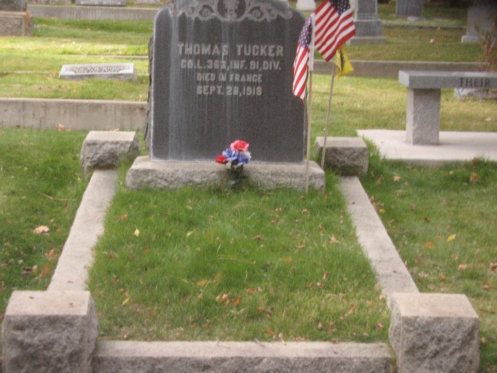 Thomas Tucker's headstone prior to cleaning.