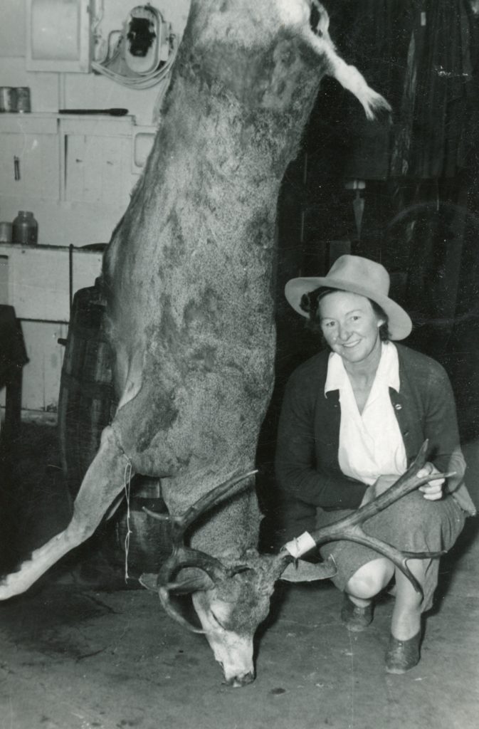 Margaret Purdy with her trophy buck 211 pounds dressed, September 24, 1947.